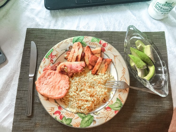 rice with noodles, fried sweet plantains, pork chops